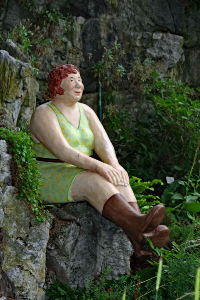 Frau in Gummistiefel Plastik